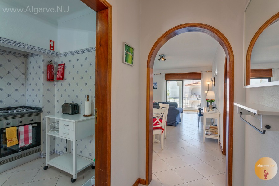 From the living room through the hallway to the master bedroom and the bathroom.