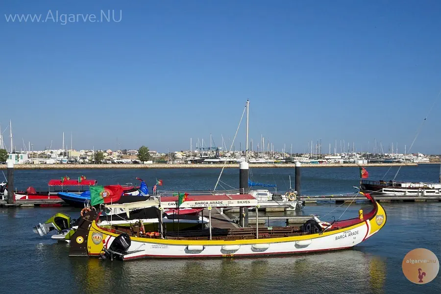 Many boats at the Arade river.